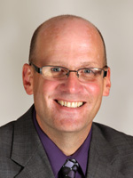 headshot of 丹尼尔·努南