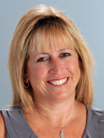 headshot of Merilee DeJohn