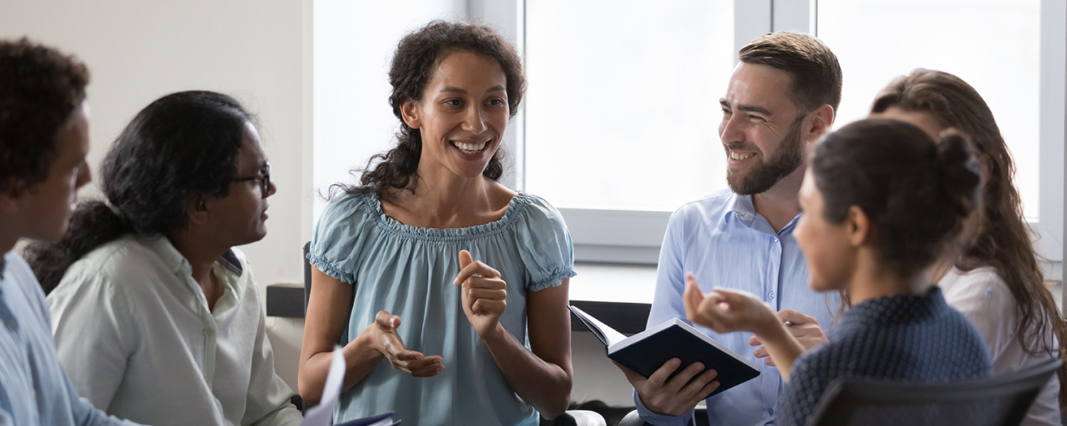 a group of CAC students talking