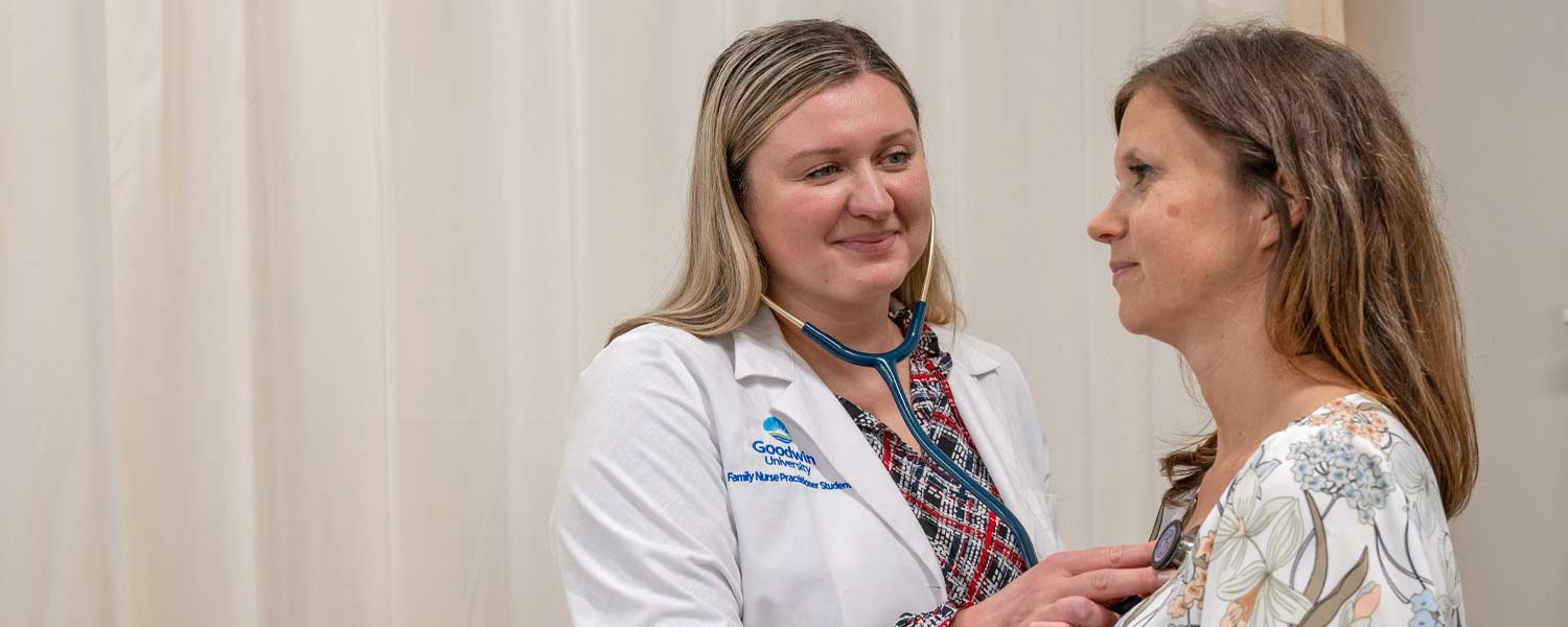 FNP student using a stethoscope on a patient