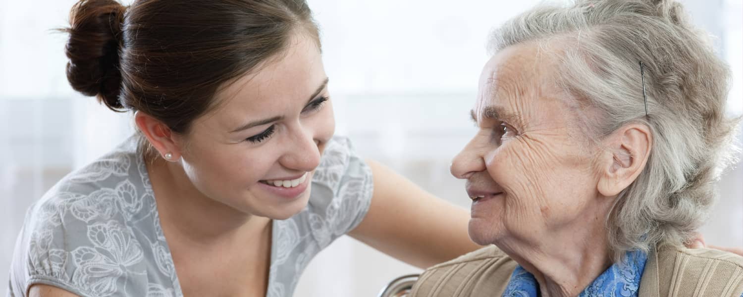 caregiver taking care of a patient